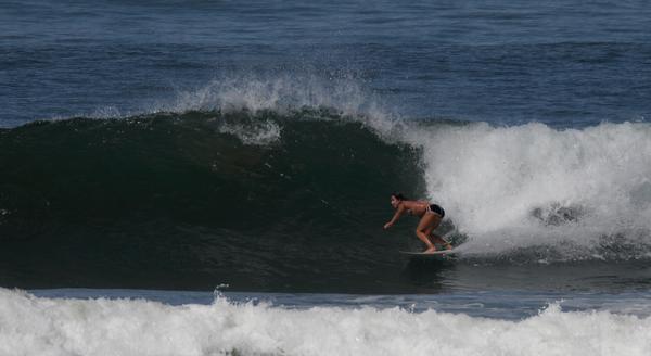 This is Brie Iatarola surfing an overhead wave in 2008.