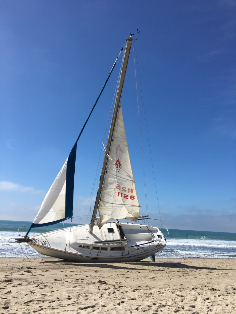 A sailboat that washed ashore during 2016 El Niño